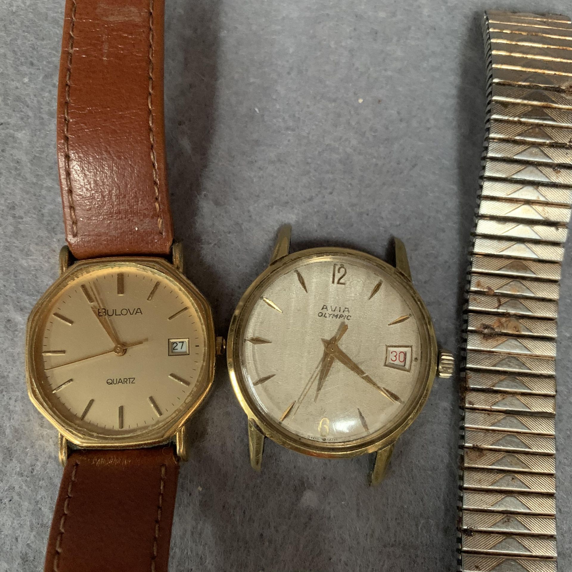 A Bulova quartz gentleman's wristwatch with brown leather strap and an Avia Olympic watch face (2)