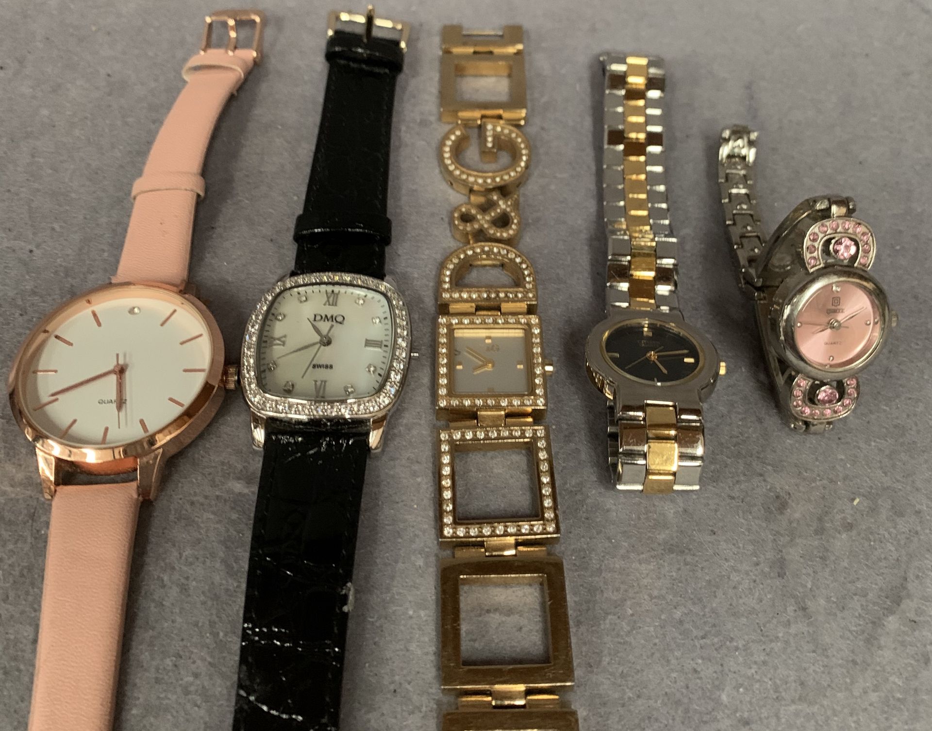 Five assorted ladies watches by Dolce & Gabbana, Citizen,