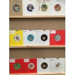 Twelve 45rpm singles, Johnny Jones and the King Casuals, Four Tops, Bill Cosby, Maxine Brown,