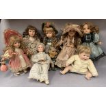 A collection of seven modern porcelain and other collectors dolls, possibly some by Leonardo,