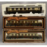 Two boxed Mainline OO gauge scale model GWR coaches and a Hornby OO gauge scale model Pullman coach