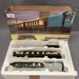 Three Hornby OO gauge scale model Pullman coaches from the Mallard Passenger Train Set