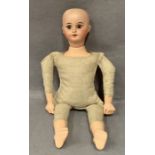 A bisque head doll marked 1902 9/0,