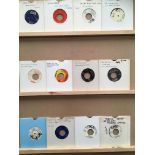 Twelve 45rpm singles, Micky Moonshine, Otis Blackwell, The Hesitations, The Reflections,