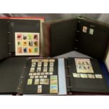 Four lever arch files and contents a quantity of World stamps featuring plants, birds,
