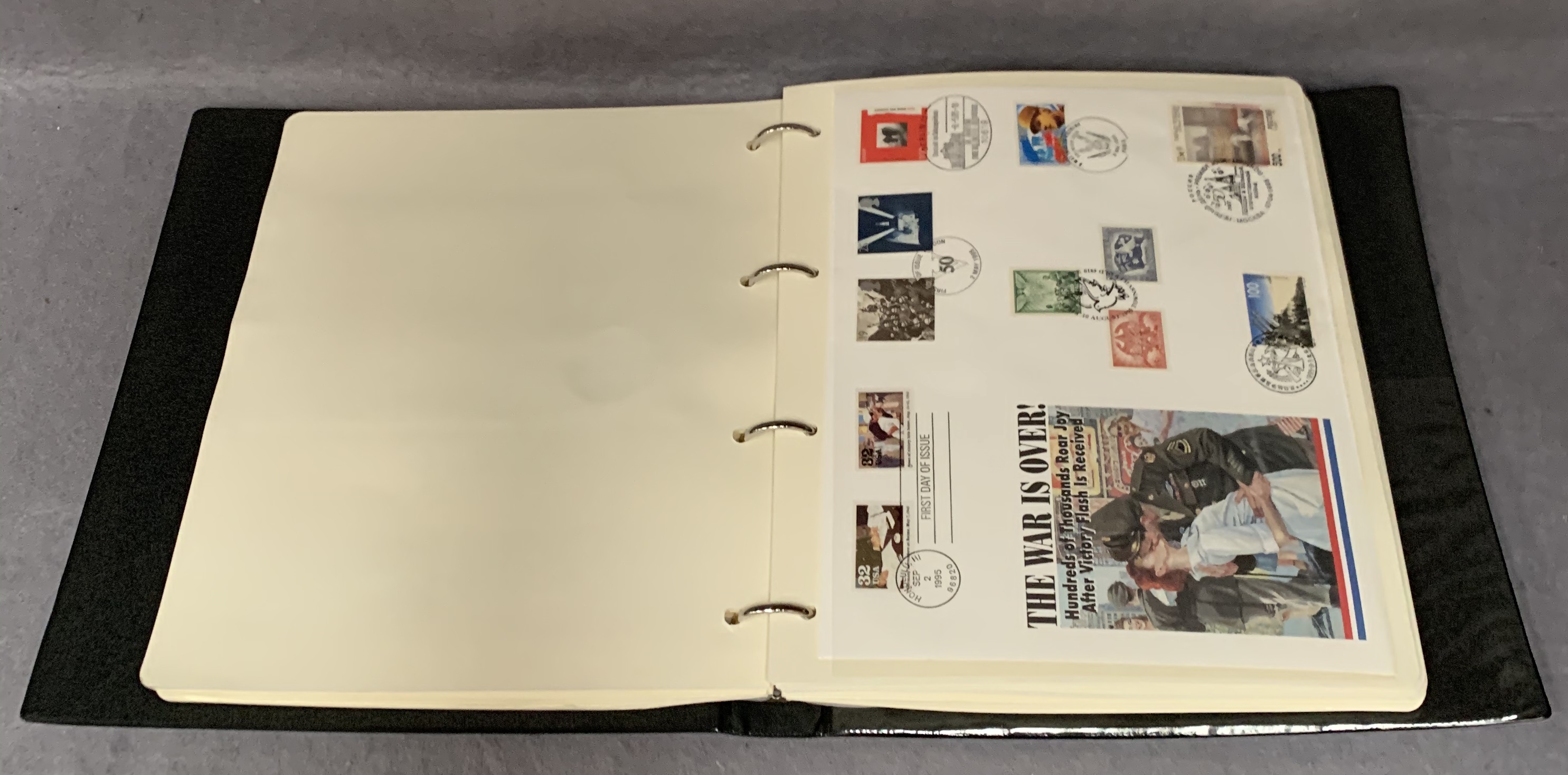 A Westminster album containing The History of World War II stamp and coin commemorative covers