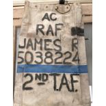 An RAF interest lot to include a Ral Hartplatte brown patterned vinyl suitcase with various badges,