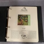A Westminster Album containing Birds of the World stamps and information pages