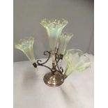 A Late 19th Century Epergne with four Vaseline glass trumpet shaped posy holders Further