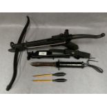 A Cobra Systems crossbow and a Rostfrei Survival Explora Kit knife in sheath (2)