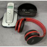 A BT cordless phone and charger,