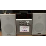 A Panasonic SA-PM3 CD stereo system complete with two speakers and remote control