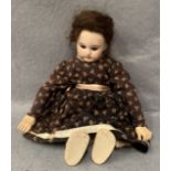 A bisque head doll marked 1894 AMS/ODE?,
