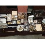 Contents to two trays - a large quantity of assorted costume jewellery - watches, bracelets,