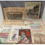A Stanley Gibbons GB stamp album featuring stamps 1960s/1970s and a quantity of old newspapers
