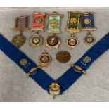 A collection of RAOB medals and badges,