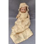 A bisque head baby doll marked AM 341/3K Germany,