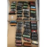Contents to two lids, fifty-two pieces of OO gauge scale model rolling stock,