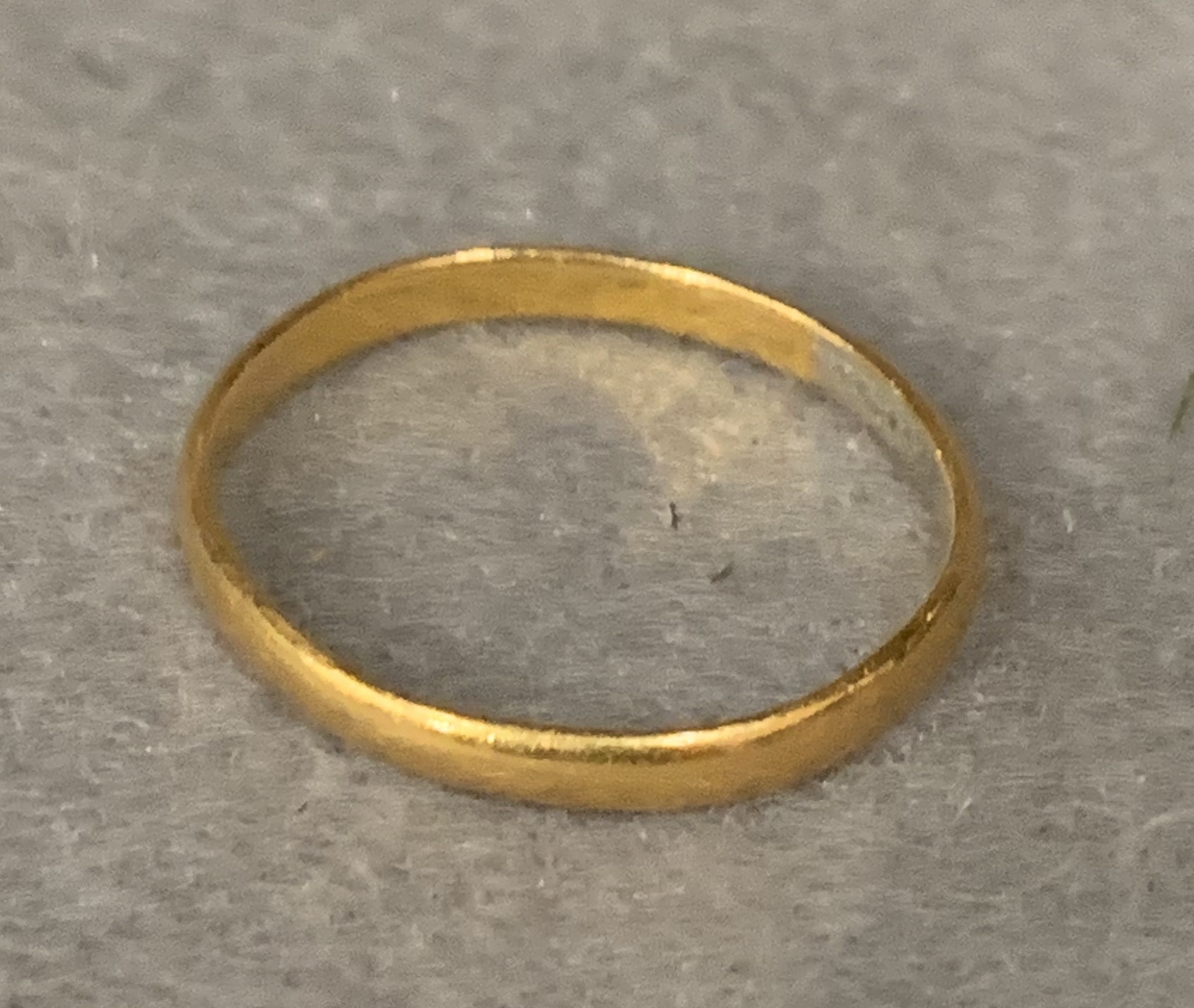 A gentleman's 22ct gold wedding ring, approximate weight 1.