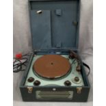 A Pye portable turntable and radio in dark blue vinyl case, serial number 0492958 (no test,
