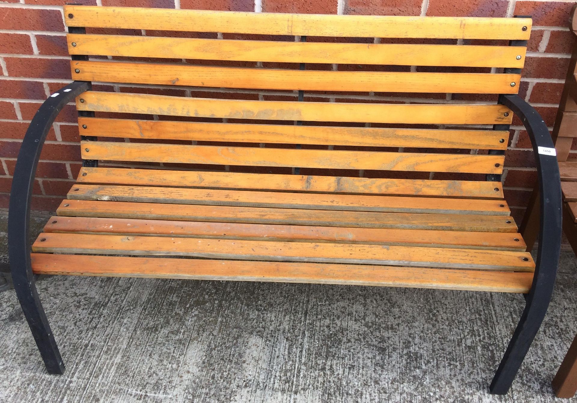 A metal and wood garden bench,
