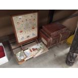 A brown fibre trunk, a small brown fibre suitcase,