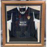 Leeds United Interest: A framed, mounted and signed Whyte and Mackay Nike shirt, 76cm x 64cm,