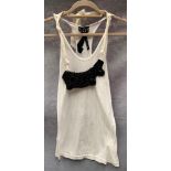 A Poleci ladies vest top, white with black necklace, one size,