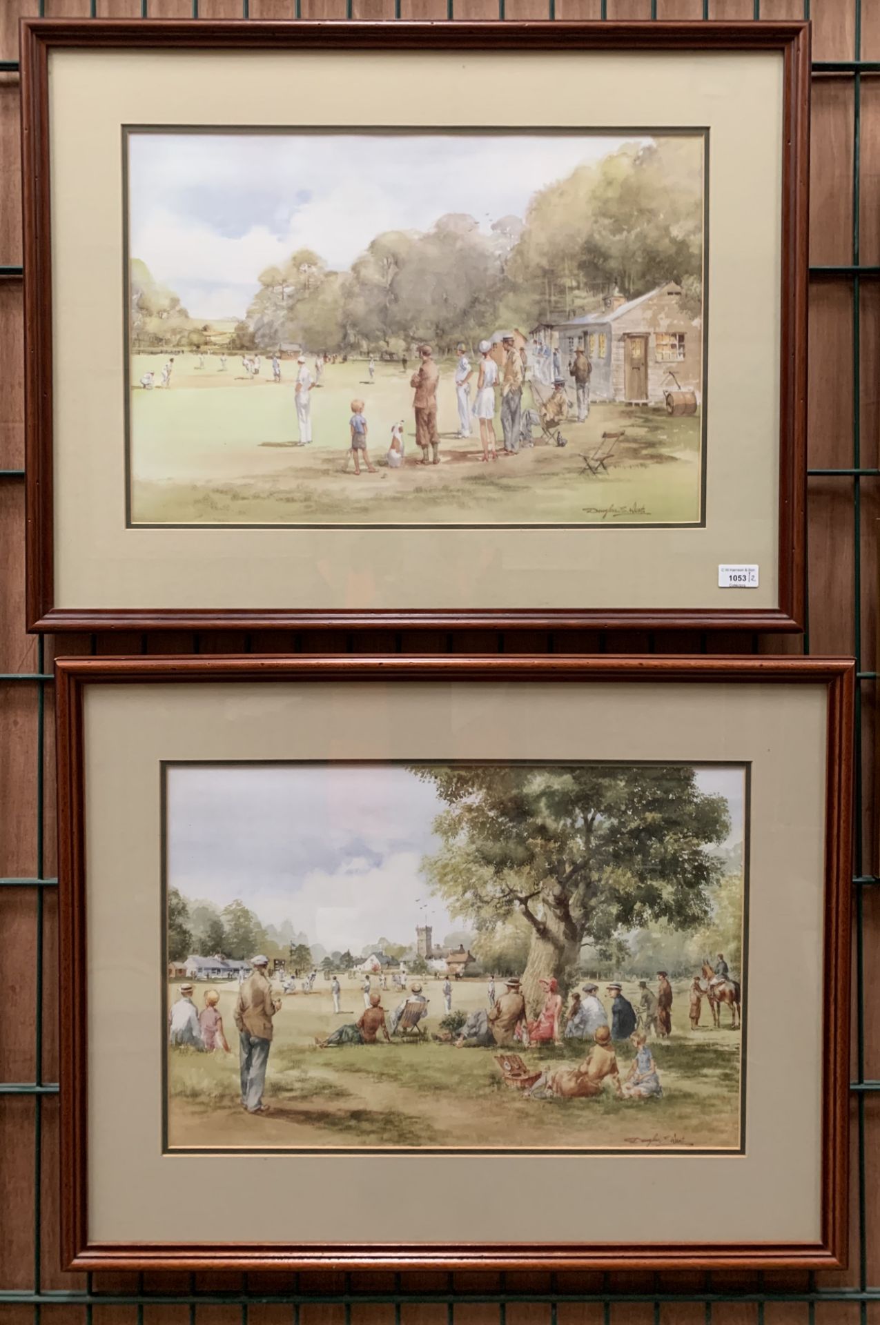 Douglas E West, two antique wood effect framed prints, village cricket scenes,