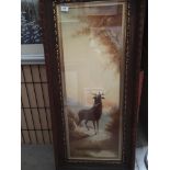 An oak framed oil painting of a stag,