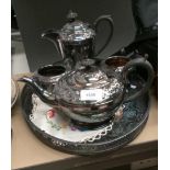 A silver plated four piece tea service and tray