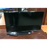 A Samsung UE32H5500AK flat screen television complete with remote control