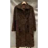 A lady's long brown coat,