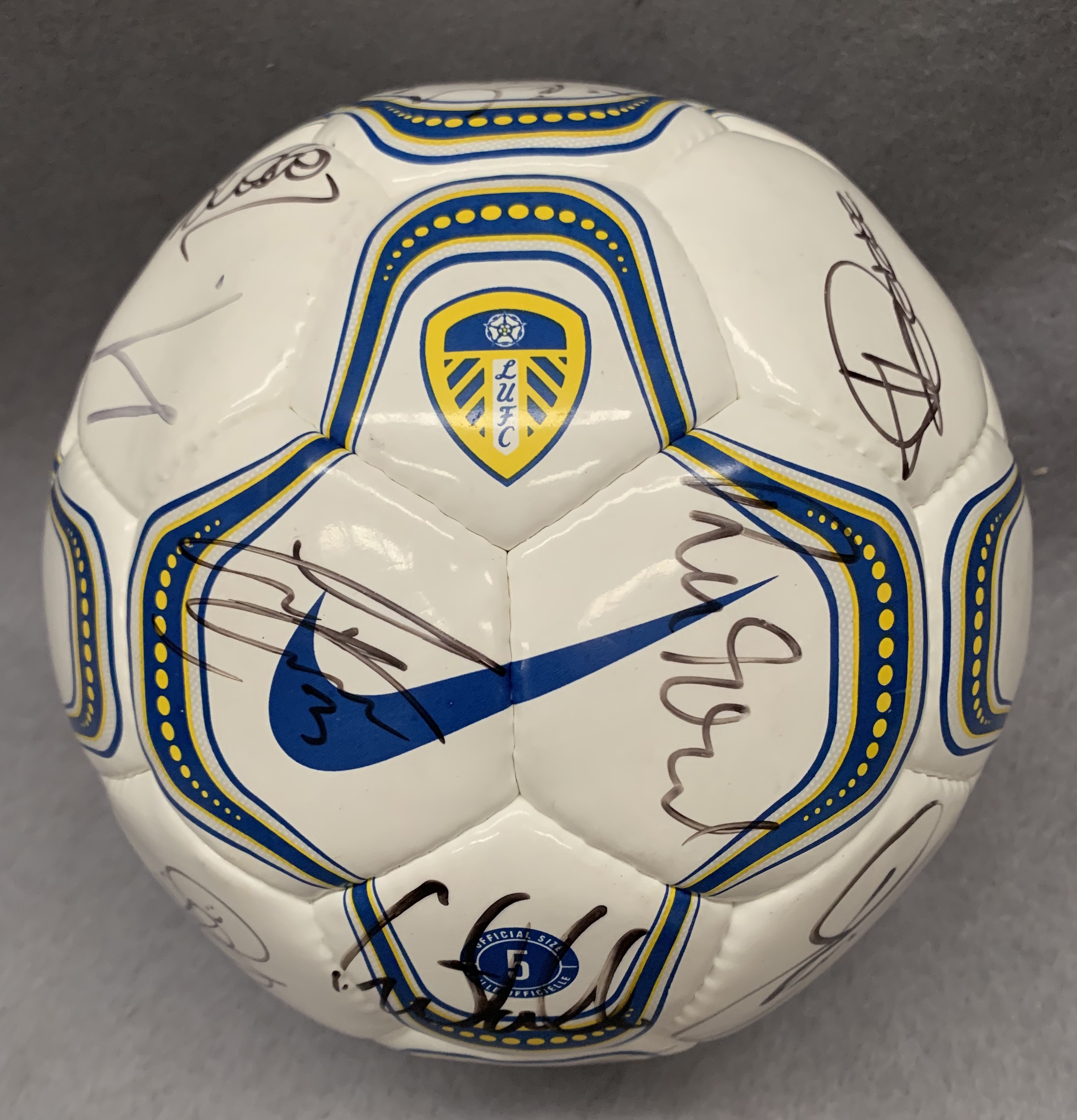 Leeds United Interest: A signed football, signatures include Lucas Radebe and others,