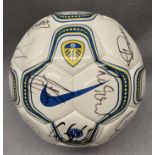 Leeds United Interest: A signed football, signatures include Lucas Radebe and others,