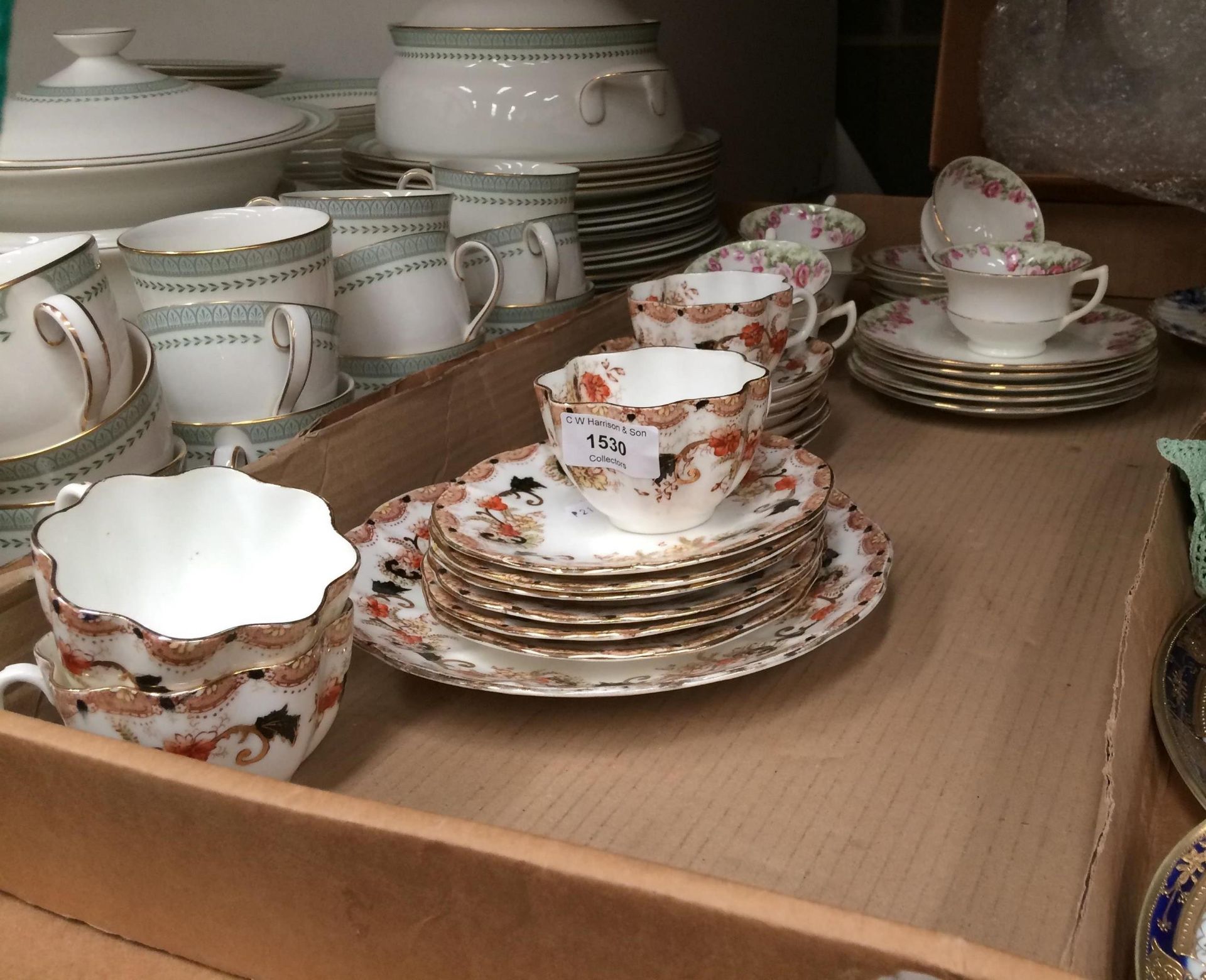 Two floral patterned part tea services (seventeen pieces to each)