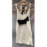 A Poleci ladies vest top, white with black necklace, one size,