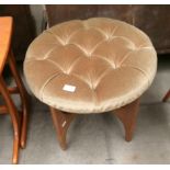 A teak G-Plan circular dressing table stool with brown upholstered top [Please note - the