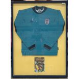 David Seaman Interest: A framed and mounted England Umbro goalkeeper's shirt,