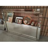 A large wall mirror,