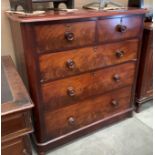 A Victorian mahogany and walnut five drawer (two short and three long) chest of drawers,