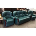 A MF International Italian green leather three piece suite with wood trim (with fire labels)