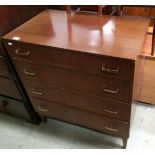 A teak four drawer chest of drawers