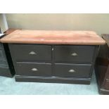 A painted pine four drawer counter with replacement top,