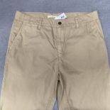 A pair of Suit men's trousers, sand, size 31W,