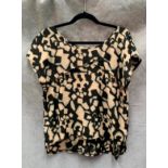 An Oxmo ladies top, black and beige pattern, size M,