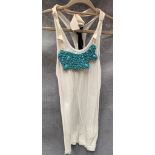 A Poleci ladies vest top, white with turquoise necklace, one size,