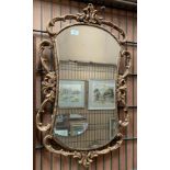 Ornate gilt framed wall mirror,