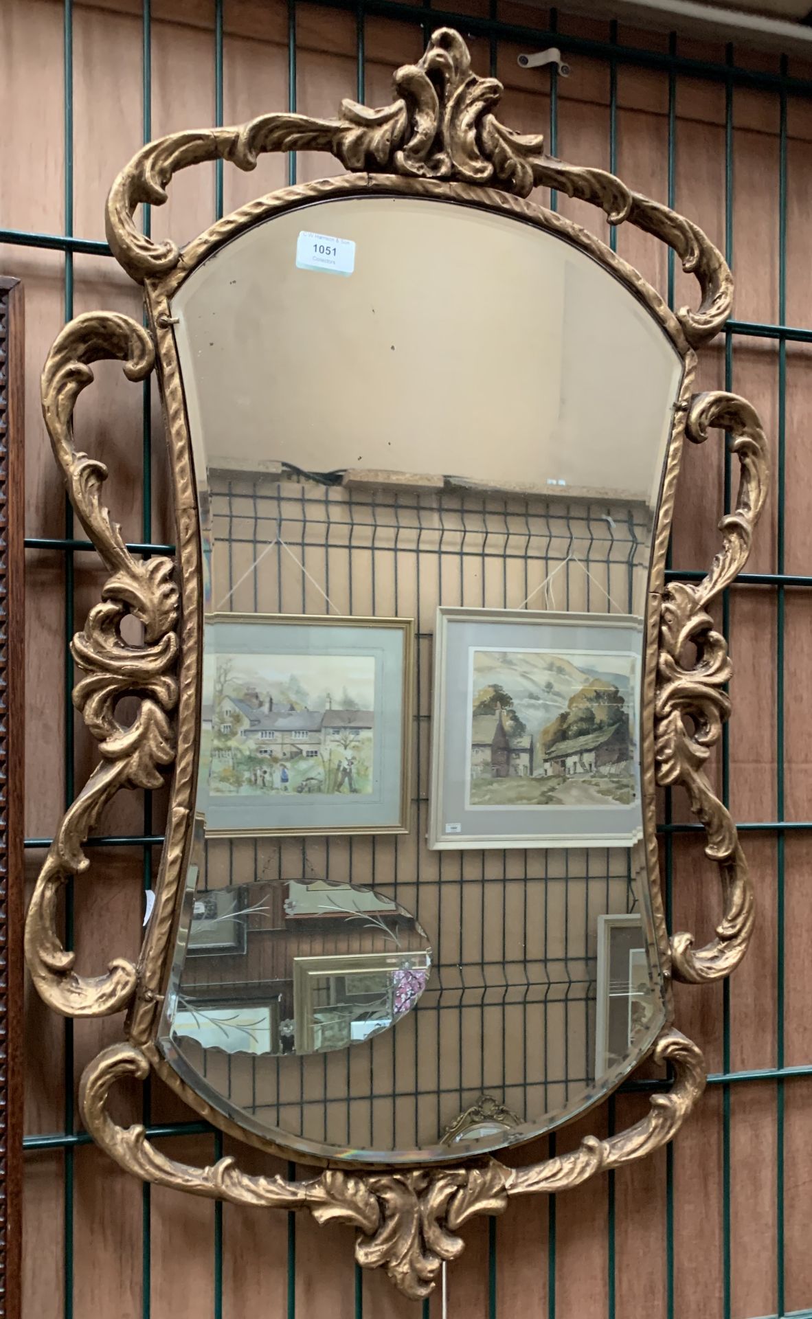 Ornate gilt framed wall mirror,