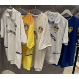 Five assorted Leeds United shirts, all with Strongbow as the sponsor, by Nike, etc.